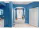 A relaxing bathroom showcases a large soaking tub and bright blue walls at 9116 Woodridge Run Dr, Tampa, FL 33647