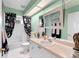 Bright bathroom featuring a tub with a shower and a vanity with lots of counter space at 9116 Woodridge Run Dr, Tampa, FL 33647