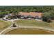 An aerial view of the community clubhouse on the golf course at 9116 Woodridge Run Dr, Tampa, FL 33647