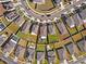 Aerial view of property showcasing the home within a cul-de-sac and large backyard space at 9334 Lemon Drop Loop, Sun City Center, FL 33573