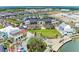 Stunning aerial view of the community showcasing upscale buildings, manicured green spaces, and charming streetscapes at 1857 N San Mateo Dr, North Port, FL 34288