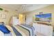 Bright bedroom with a comfortable bed, closet, and plenty of natural light at 1857 N San Mateo Dr, North Port, FL 34288