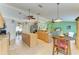 Open kitchen with large island and view of Gathering room and dining area at 1857 N San Mateo Dr, North Port, FL 34288