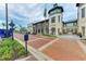 Charming town center featuring beautiful architecture, retail shops, and landscaped walkways at 1857 N San Mateo Dr, North Port, FL 34288