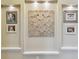 Aesthetically pleasing wall decor with recessed lighting and decorative wall hangings at 11307 Quiet Forest Dr, Tampa, FL 33635