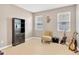 Music room/office with tile floors, guitar, and built-in bookcase at 11423 Brighton Knoll Loop, Riverview, FL 33579