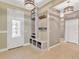 Inviting entryway with custom built-in storage and decorative accents at 11423 Brighton Knoll Loop, Riverview, FL 33579