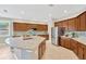 Large kitchen with stainless steel appliances, granite countertops, and beautiful cabinetry at 11423 Brighton Knoll Loop, Riverview, FL 33579