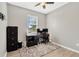 Bright office space featuring a modern desk, stylish rug, and ample storage at 11423 Brighton Knoll Loop, Riverview, FL 33579