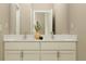 Bathroom with double sink vanity, neutral color scheme and modern fixtures at 11546 Flourish Dr, Land O Lakes, FL 34637