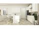 Bright, modern kitchen with stainless steel appliances and island with bar seating at 11546 Flourish Dr, Land O Lakes, FL 34637