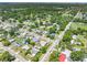 Expansive aerial view showcasing the neighborhood's mature trees, established homes, and pleasant surroundings at 1213 W Camellia Dr, Brandon, FL 33510