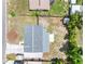 Aerial view showcases the home, the spacious backyard, and its location at 1213 W Camellia Dr, Brandon, FL 33510