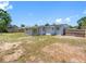 Spacious backyard featuring a fenced in yard and covered patio at 1213 W Camellia Dr, Brandon, FL 33510