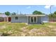 The backyard features partial fencing and a small patio for outdoor enjoyment at 1213 W Camellia Dr, Brandon, FL 33510