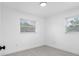 Bright bedroom with natural light with light wood-look floors at 1213 W Camellia Dr, Brandon, FL 33510