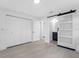 Bright bedroom features a barn door leading to the bathroom and ample closet space at 1213 W Camellia Dr, Brandon, FL 33510