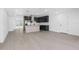 Open-concept kitchen with stainless steel appliances, an island and modern cabinetry at 1213 W Camellia Dr, Brandon, FL 33510