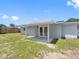 Covered patio featuring support beams and white trim at 1213 W Camellia Dr, Brandon, FL 33510