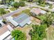 Aerial view of home's rear exterior featuring a new roof and an expansive, fenced yard at 1213 W Camellia Dr, Brandon, FL 33510