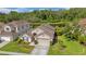 Beautiful aerial view of a home backing to a scenic pond at 12510 Loquat Way, Tampa, FL 33626