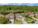 Aerial view showcasing home's location with a large pond behind it at 12510 Loquat Way, Tampa, FL 33626