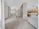 Open-concept dining area with neutral tones, and easy access to the kitchen and living spaces at 12510 Loquat Way, Tampa, FL 33626