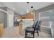 Kitchen featuring granite countertops, stainless steel appliances, and breakfast bar with seating at 12510 Loquat Way, Tampa, FL 33626