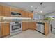 Well-equipped kitchen featuring stainless steel appliances and plenty of countertop space at 12510 Loquat Way, Tampa, FL 33626