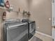Functional laundry area with modern washer and dryer units at 12510 Loquat Way, Tampa, FL 33626