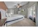 Relaxing main bedroom with neutral walls and a view of the backyard at 12510 Loquat Way, Tampa, FL 33626