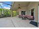 Spacious outdoor patio area with comfortable seating, perfect for relaxing at 12510 Loquat Way, Tampa, FL 33626