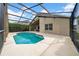 Beautiful screened-in pool area, ideal for enjoying the outdoors at 12510 Loquat Way, Tampa, FL 33626