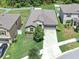 Aerial view of the property showcasing the home, driveway, and fenced backyard at 12907 Wildflower Meadow Dr, Riverview, FL 33579