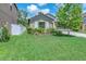 Charming home with well-maintained lawn, landscaping and a two-car garage at 12907 Wildflower Meadow Dr, Riverview, FL 33579