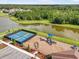 A high-angle view of the community playground and tennis courts at 13157 Peachleaf Ave, Riverview, FL 33579