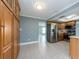 Bright kitchen features stainless steel appliances, tile floors, and ample cabinet space for storage at 14045 90Th Pl, Seminole, FL 33776