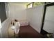 Sun room with a twin bed, vinyl blinds, and outdoor access at 1406 Arrowhead W Cir, Clearwater, FL 33759