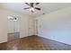 Bedroom with closet, ceiling fan, parquet flooring, and interior doorway at 201 Westwood N Ter, St Petersburg, FL 33710