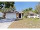 Charming single-story home with stone accents and a well-maintained front yard at 201 Westwood N Ter, St Petersburg, FL 33710