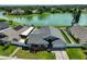 Aerial view of the single Gathering home with a large lake in the backyard at 2021 Elk Spring Dr, Brandon, FL 33511