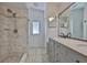 Bathroom with a marble walk-in shower and granite countertops at 2021 Elk Spring Dr, Brandon, FL 33511