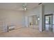 Bedroom featuring ceiling fan, tile flooring, and mirrored closet doors at 2021 Elk Spring Dr, Brandon, FL 33511