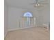 Bedroom featuring carpet, a ceiling fan, and a decorative window at 2021 Elk Spring Dr, Brandon, FL 33511
