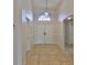 Bright and spacious foyer entrance with high ceilings and decorative tile flooring at 2021 Elk Spring Dr, Brandon, FL 33511