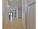 Spacious foyer featuring tile flooring and elegant archways leading to various rooms at 2021 Elk Spring Dr, Brandon, FL 33511