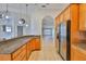Kitchen featuring an island with granite countertops and stainless steel appliances at 2021 Elk Spring Dr, Brandon, FL 33511