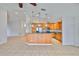 View of kitchen with stainless steel appliances and light colored cabinets with tile floors at 2021 Elk Spring Dr, Brandon, FL 33511