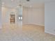 Spacious living room featuring neutral tile floors and an open layout with recessed lighting at 2021 Elk Spring Dr, Brandon, FL 33511