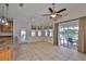 Bright living space with access to the lanai, complemented by tile floors and natural light at 2021 Elk Spring Dr, Brandon, FL 33511